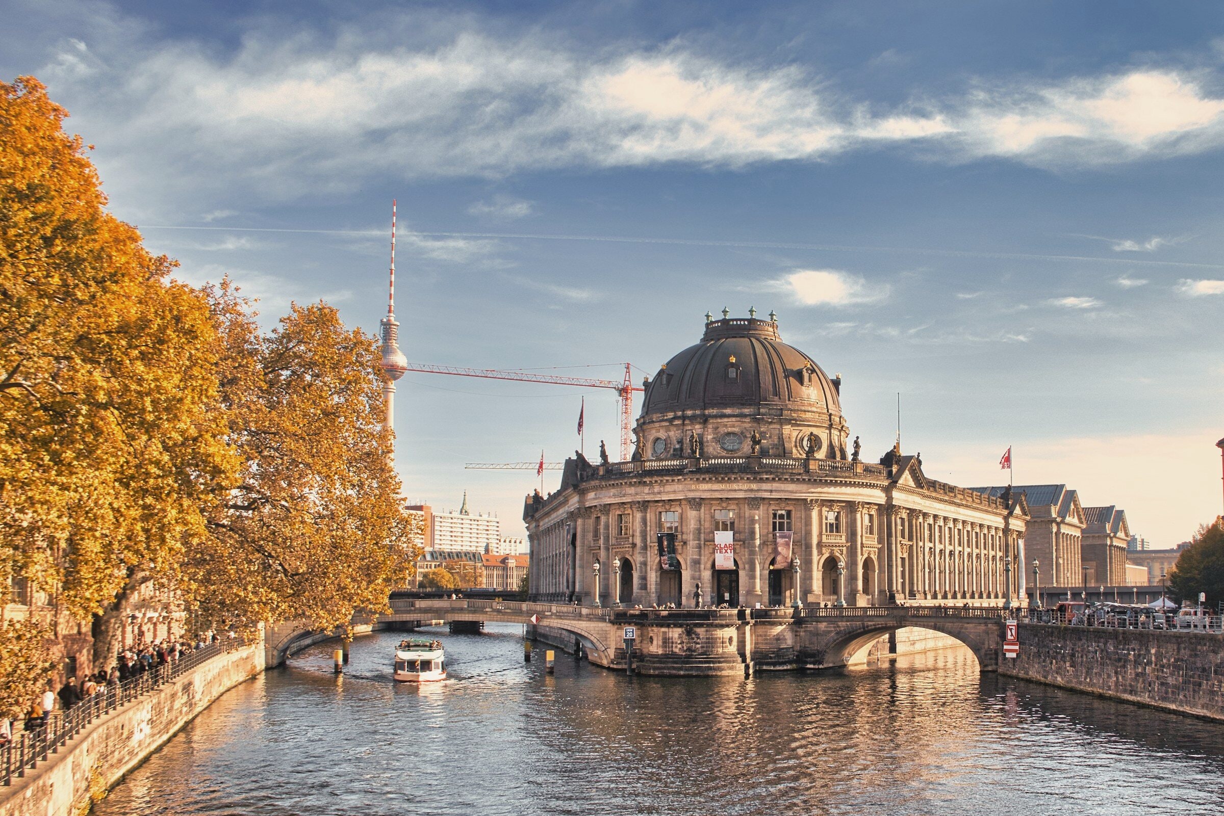 The Bode-Museum in autumn light, the Spree in the foreground.